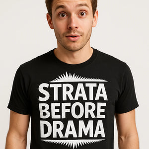 Close-up of the "Strata Before Drama" white print on a premium Bella+Canvas black paleontology t shirt