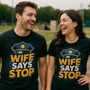 Person wearing the black police officer shirts graphic tee - "Wife Says Stop" design
