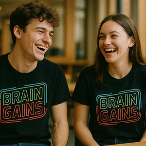 Person wearing the black studying t shirt graphic tee - "Brain Gains" design