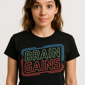 Close-up of the "Brain Gains" gray print on a premium Bella+Canvas black studying t shirt