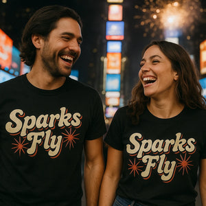 Person wearing the black new years eve shirts for women graphic tee - "Sparks Fly" design