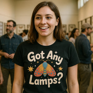 Lifestyle shot of the "Got Any Lamps" black moth t shirt in a real-world setting