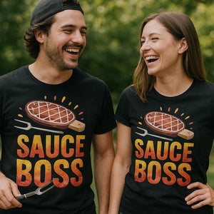 Person wearing the black t shirt bbq graphic tee - "Sauce Boss" design