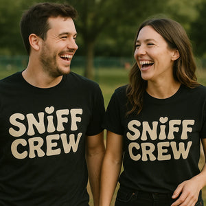 Person wearing the black funny t shirts for dog lovers graphic tee - "Sniff Crew" design