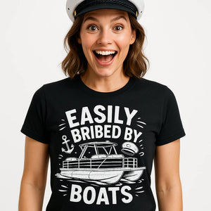 Close-up of the "Easily Bribed By Boats" white print on a premium Bella+Canvas black custom boat shirts