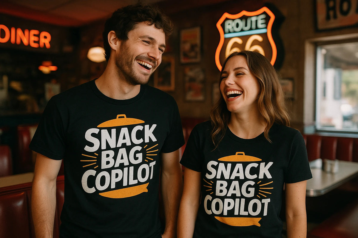 Person wearing the black road trip shirts graphic tee - "Snack Bag Copilot" design