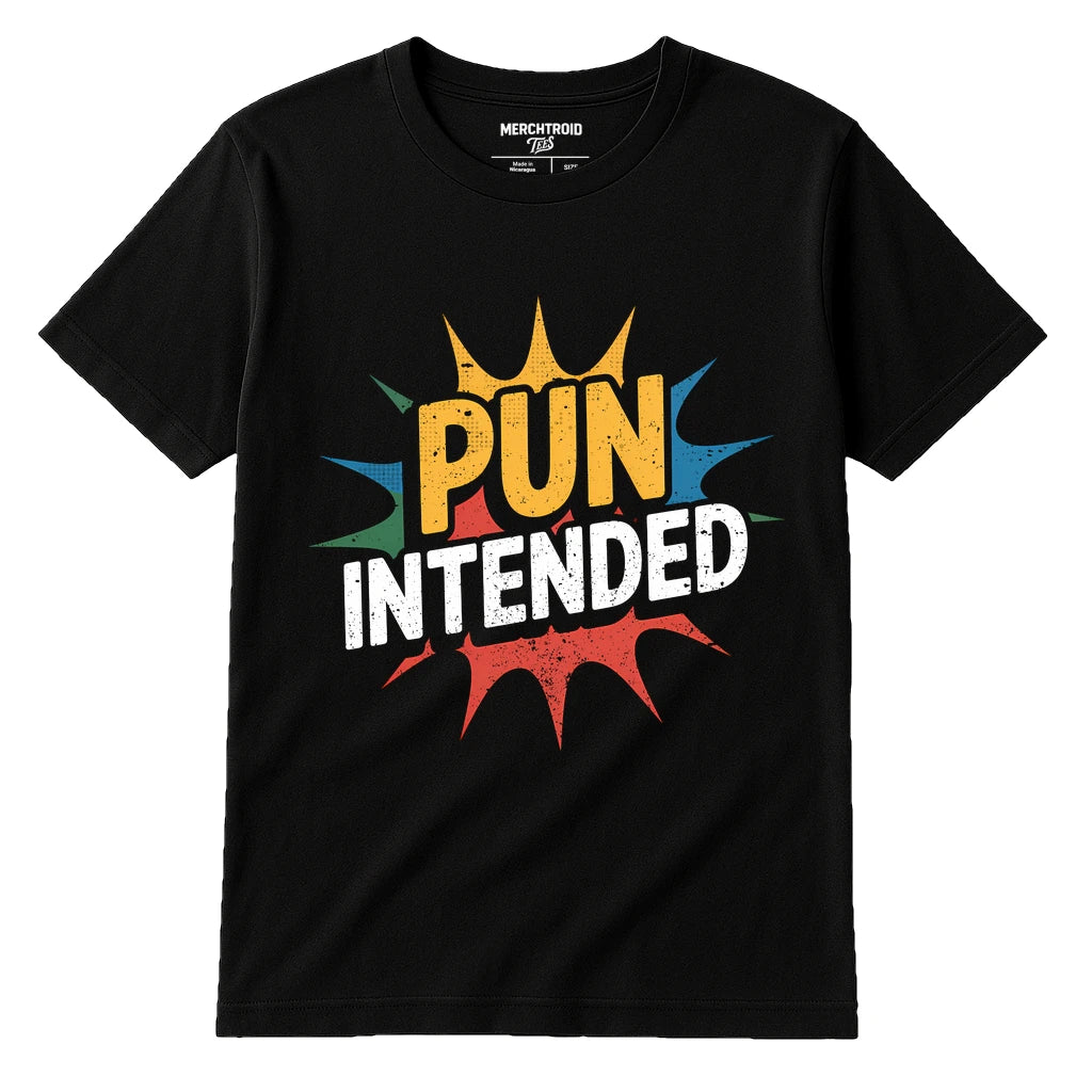 A black t-shirt with a colorful comic-style design featuring the text "PUN INTENDED". The words are surrounded by burst shapes in yellow, blue, red, and green.