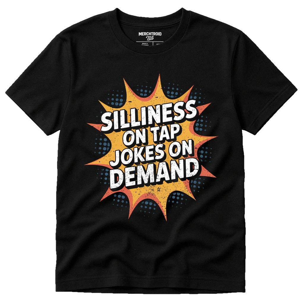 Black Comedy T Shirt - "Silliness on Tap Jokes on Demand" graphic tee with gold print, flat lay product photo