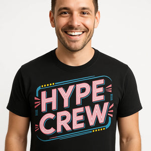 Close-up of the "Hype Crew" pink print on a premium Bella+Canvas black socializing t shirt