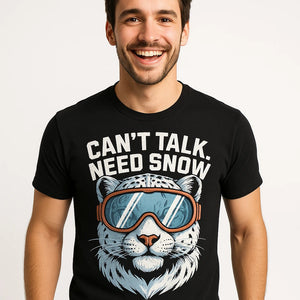 Close-up of the "Can'T Talk. Need Snow" gray print on a premium Bella+Canvas black snowboard tee