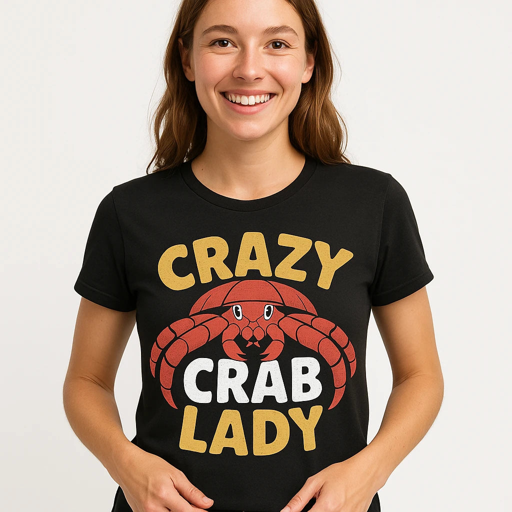 Close-up of the "Crazy Crab Lady" gold print on a premium Bella+Canvas black hermit crab t shirt
