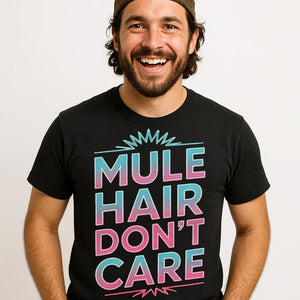Close-up of the "Mule Hair Don'T Care" gray print on a premium Bella+Canvas black mule t shirt