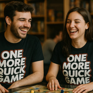 Person wearing the black board game t shirt graphic tee - "One More Quick Game" design