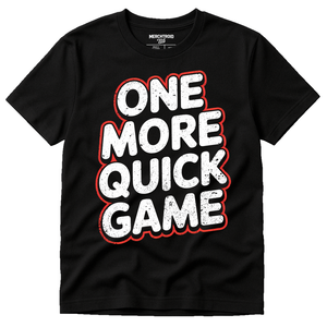 Black Board Game T Shirt - "One More Quick Game" graphic tee with white print, flat lay product photo