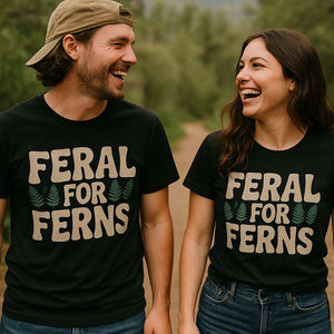 Person wearing the black nature walk t shirt graphic tee - "Feral for Ferns" design
