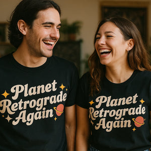 Person wearing the black astrology shirts graphic tee - "Planet Retrograde Again" design