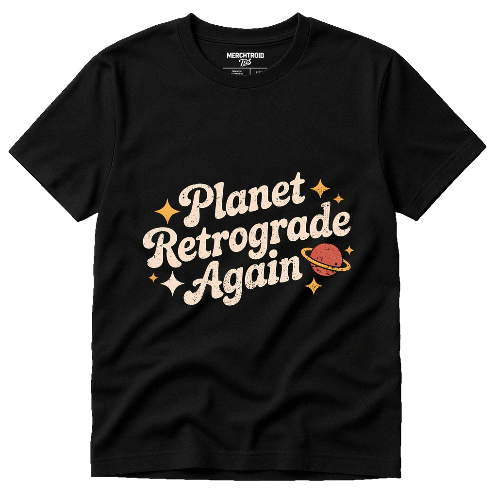 Black Astrology Shirts - "Planet Retrograde Again" graphic tee with cream print, flat lay product photo