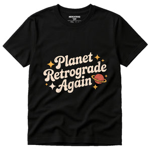 Black Astrology Shirts - "Planet Retrograde Again" graphic tee with cream print, flat lay product photo