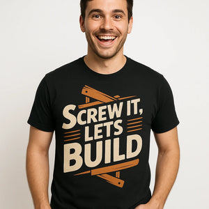 Close-up of the "Screw It Lets Build" beige print on a premium Bella+Canvas black carpentry shirts