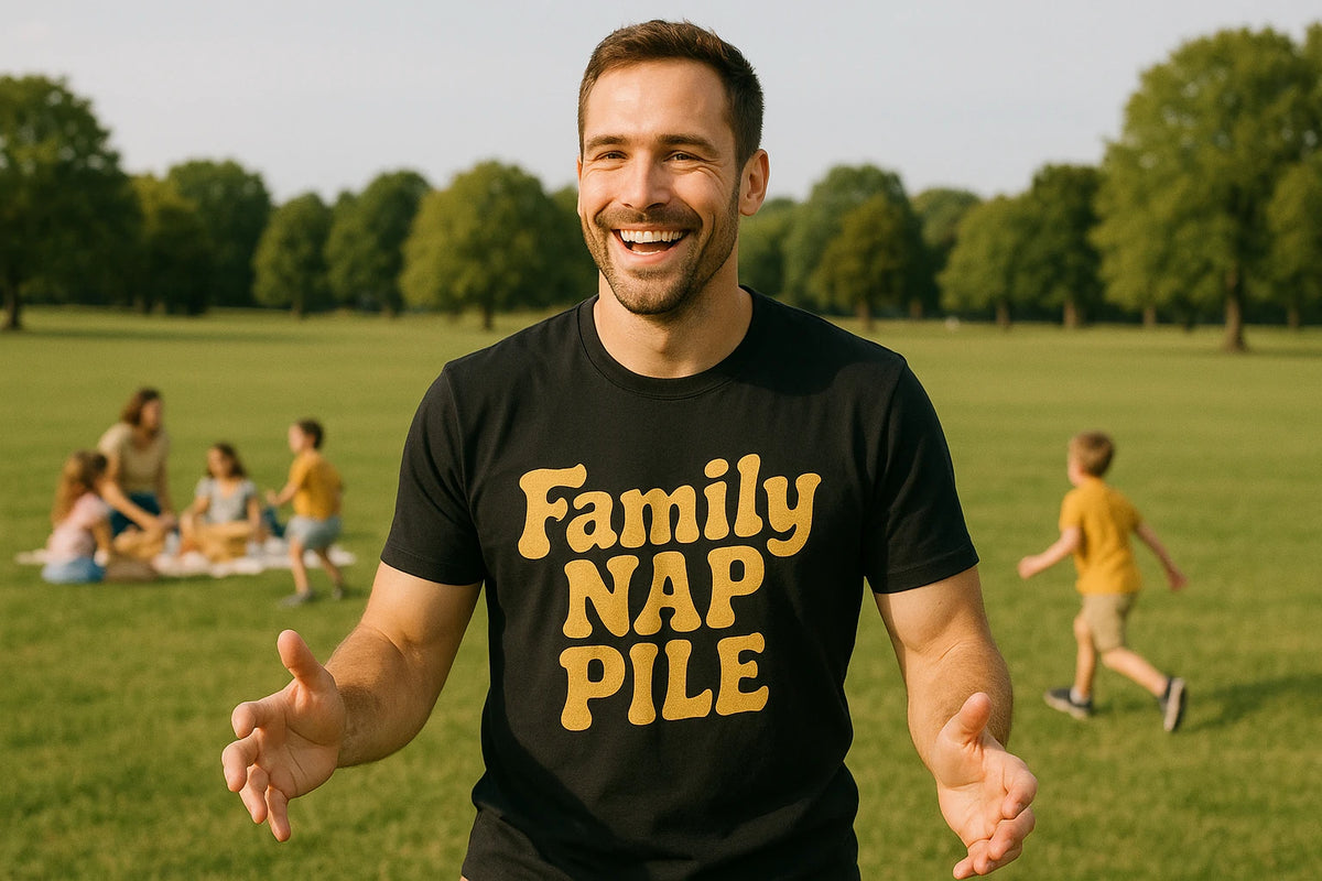 Lifestyle shot of the "Family Nap Pile" black family life t shirt in a real-world setting