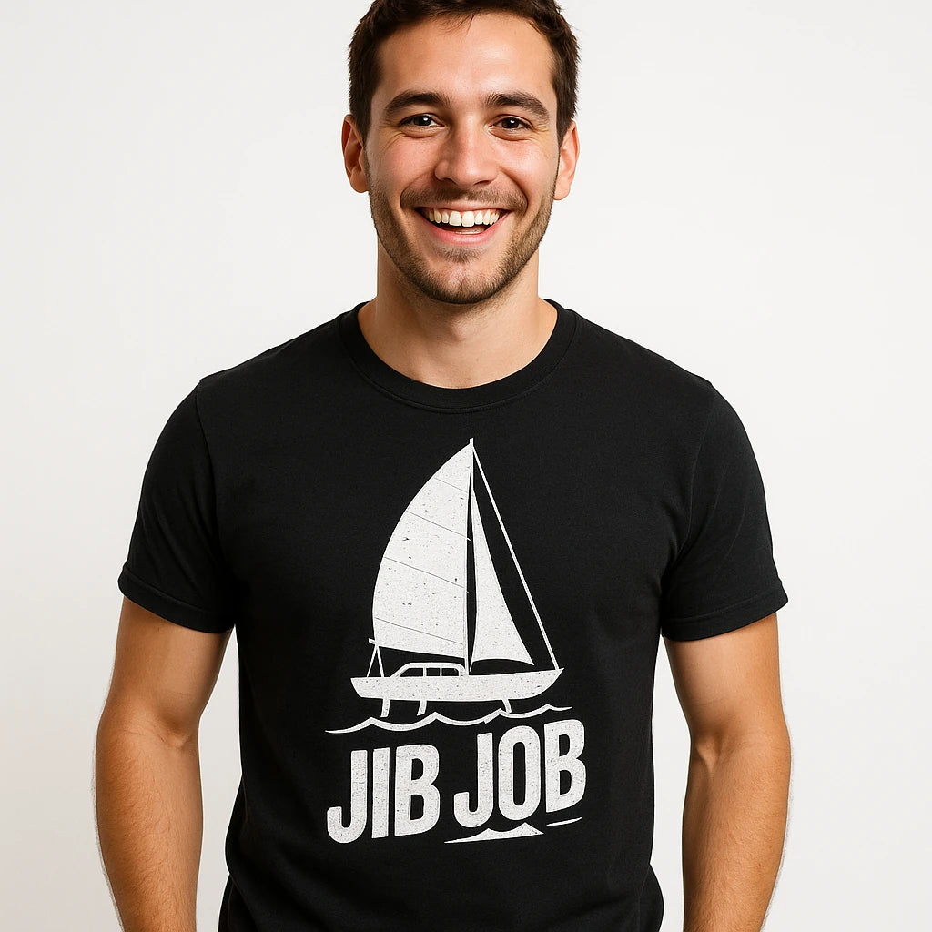 Close-up of the "Jib Job" white print on a premium Bella+Canvas black sailing shirts