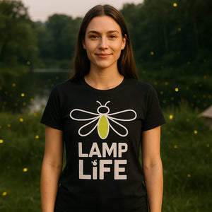 Lifestyle shot of the "Lamp Life" black firefly t shirt in a real-world setting