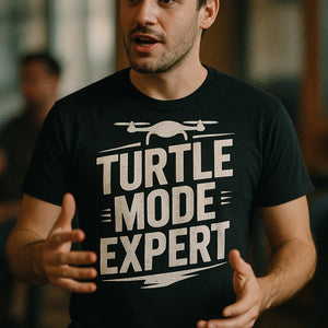 "Turtle Mode Expert" black drone shirts, photographed as gift for drone lover