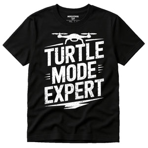 Black Drone Shirts - "Turtle Mode Expert" graphic tee with white print, flat lay product photo