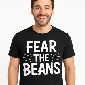 Close-up of the "Fear the Beans" white print on a premium Bella+Canvas black cat lovers t shirt